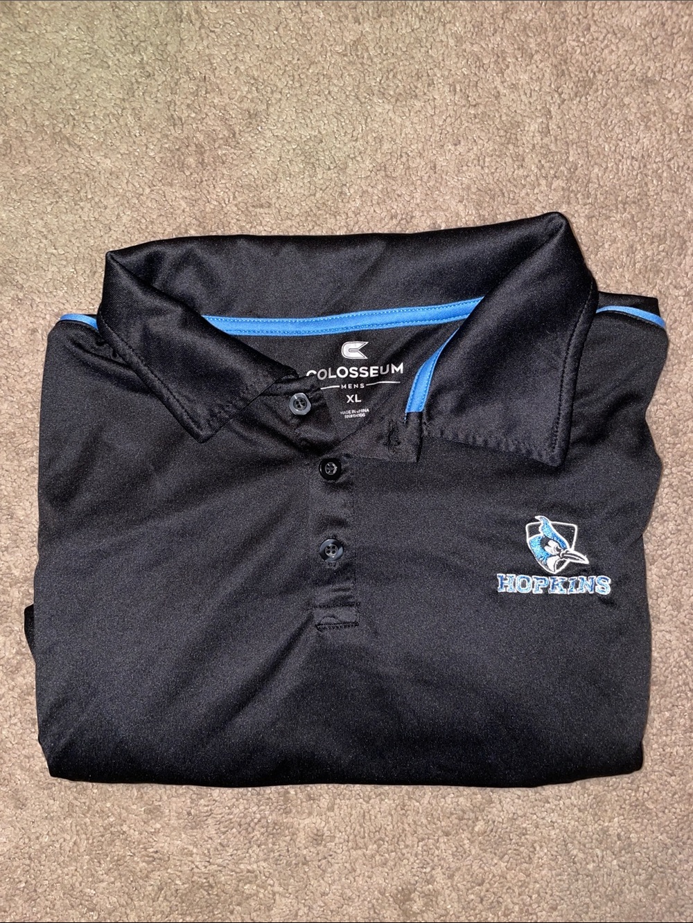 Johns Hopkins University - Colosseum Men’s Black Golf Polo with Blue Accents